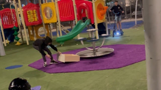 Drawer bounces off spinning carousel and hits the person trying to record the fun