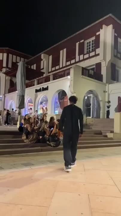 Man Showing off Handstand in Front of Girls Falls Into Them