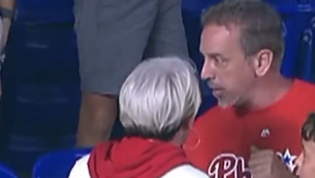 Angry Phillies fan chases down dad and forces him to give her the ball that was meant for a kid