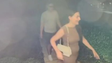 Funny doorbell footage shows woman shoving her partner into bush before entering home