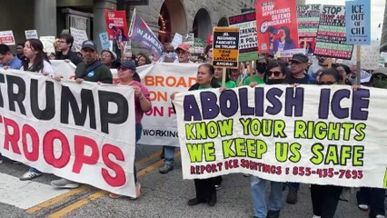 Protesters in Chicago strike defiant tone in the face of Trump's ICE threats