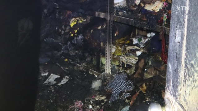 아파트 화재로 거주자 2명 화상...주민 10여 명 대피 / YTN