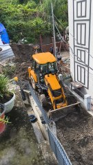 Narrow space and excavation through Backhoe Loader ongoing