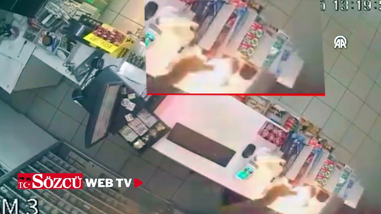 Market sahibinin elindeki çakmak gazı tüpünün alev alması kamerada