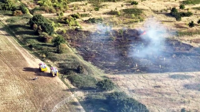 Huge fire takes over field in Northampton as fire service believe it was started deliberately