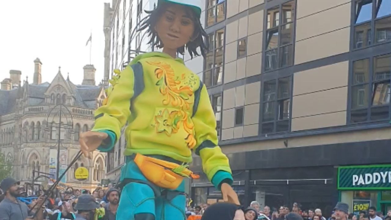 Robot towering over crowd becomes star attraction at lively Bradford Festival celebration