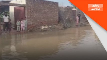 Penduduk di daerah Multan terperangkap akibat banjir