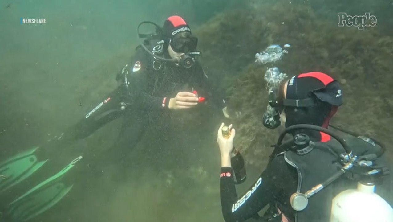 Diver Stages One-of-a-Kind Underwater Proposal in the Black Sea — Complete with Champagne