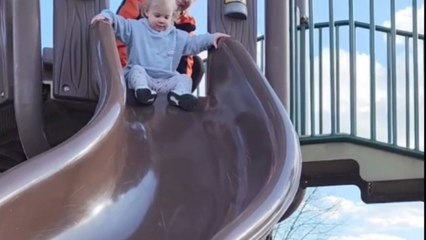 Toddler tests out playground slide and quickly regrets it after unexpected fail moment