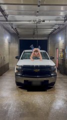 Man Slides Off Car at Car Wash