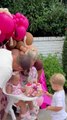 Kid Takes Bite of Little Sister's Birthday Cake During Celebration