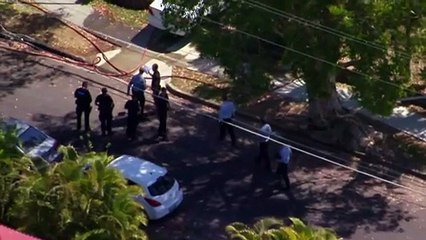 Man hospitalised after being shot by police responding to house fire