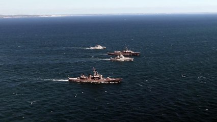 Royal Navy's HMS Enterprise sailing alongside international warships