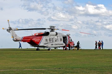 999 teams rescue injured woman from the Headland
