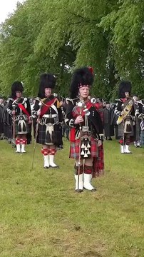 Marching with Pride Highland Pipe Band Marching during the 2024 Oldmeldrum Games