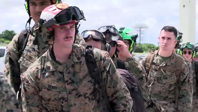 Marines with III Marine Expeditionary Force (III MEF) depart Kadena Air Base, Okinawa, aboard a U.S. Air Force C-130H Hercules. The movement highlights joint interoperability and rapid deployment capability across the Indo-Pacific region.