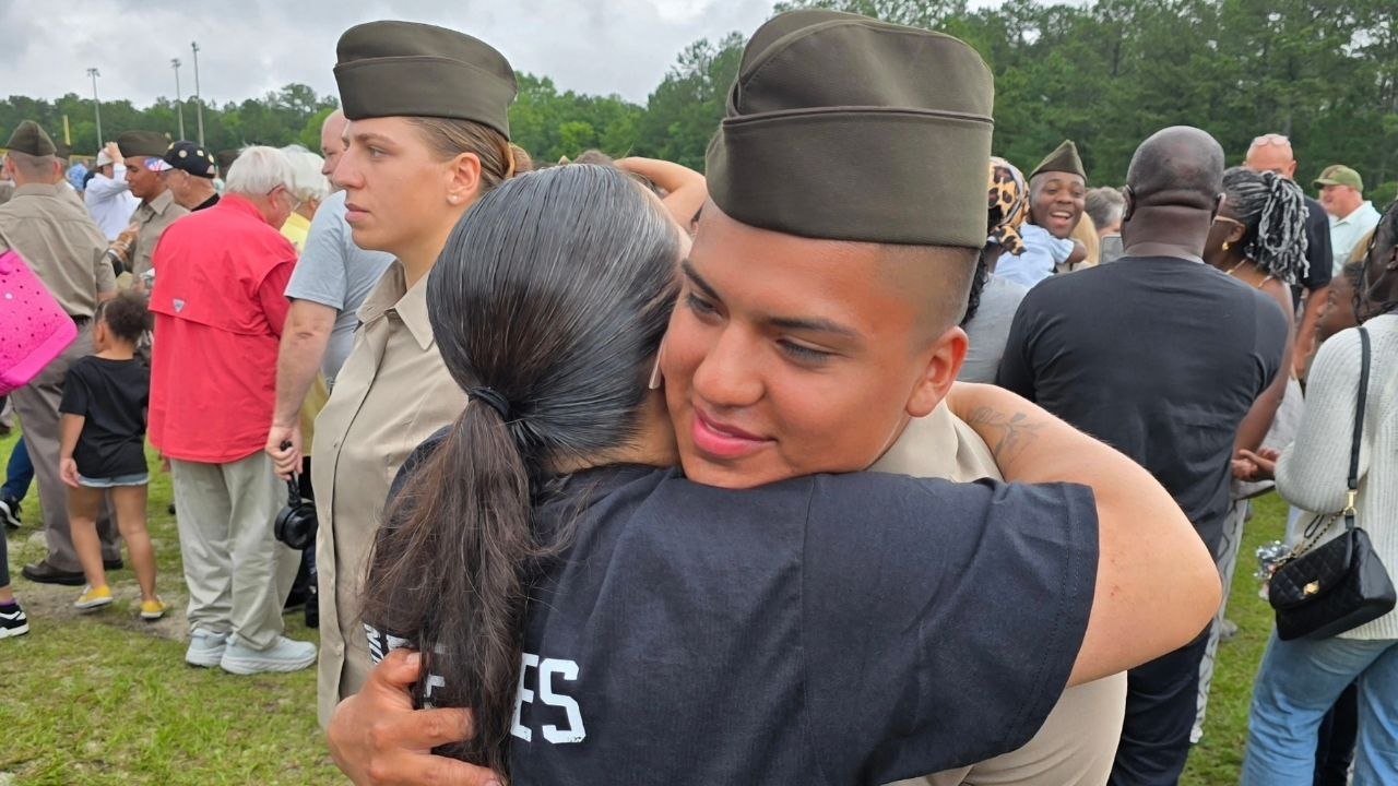 Native American Family Bless New Soldier With Sacred Tobacco At Tapping Out Ceremony