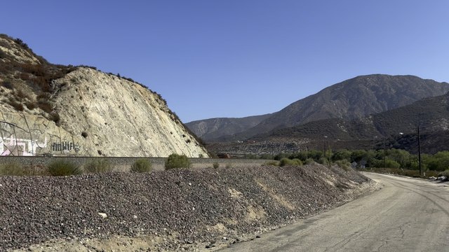 BNSF 7965 Leads Westbound Stack Train Rolling Through Blue Cut CA.