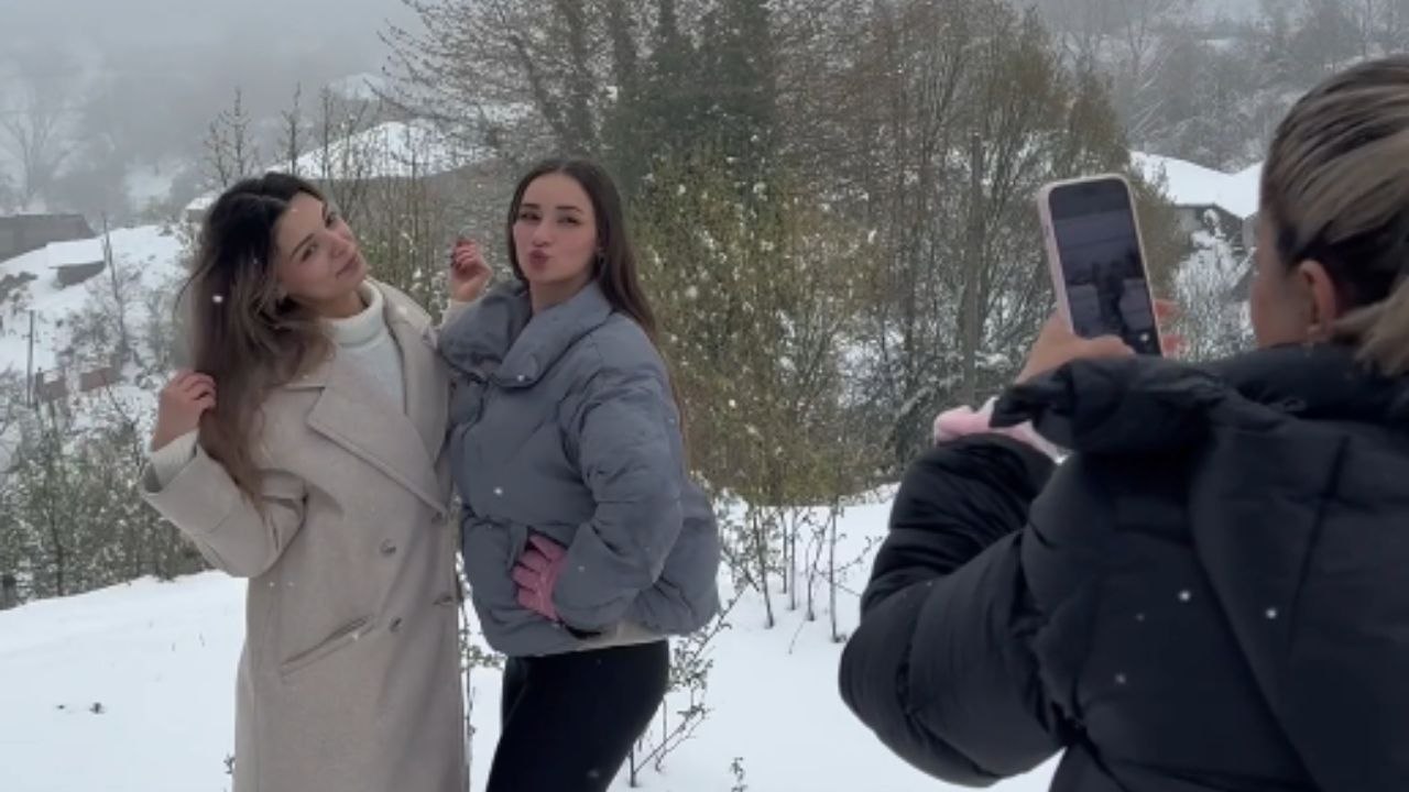 Girl tries to dodge snowballs but gets hit with a marriage proposal
