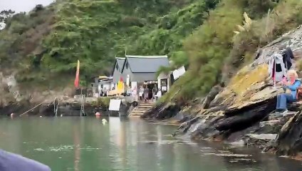 Dylan King at the finish line with dad ross following