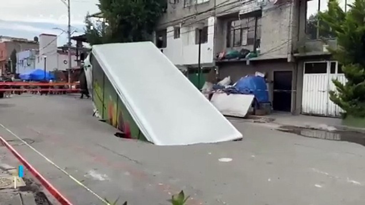 A sinkhole swallows a truck in Itzapalapa, Mexico