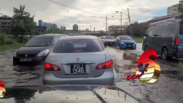 HEAVY RAINFALL CAUSES FLOODING AND TRAFFIC GRIDLOCK IN PORT OF SPAIN