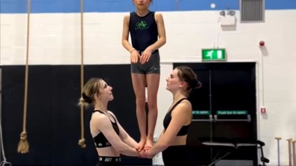 Girl tries an acrobatic move but misses the platform and ends up falling