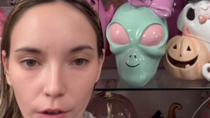 Girl discovers alien face ornament in a store with identical features to hers
