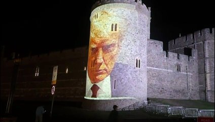 Clips of Epstein and Trump projected on Windsor Castle