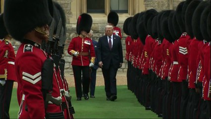 Donald Trump inspects guard of honour at Windsor Castle