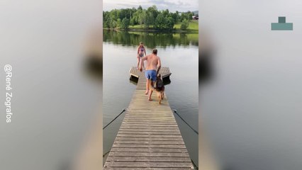 Hilarious Moment Man and Dog Fall Into the Lake