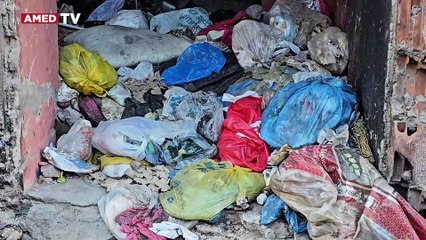 Diyarbakır’da skandal iddia! Belediye personeli çöpleri apartmana döküyor