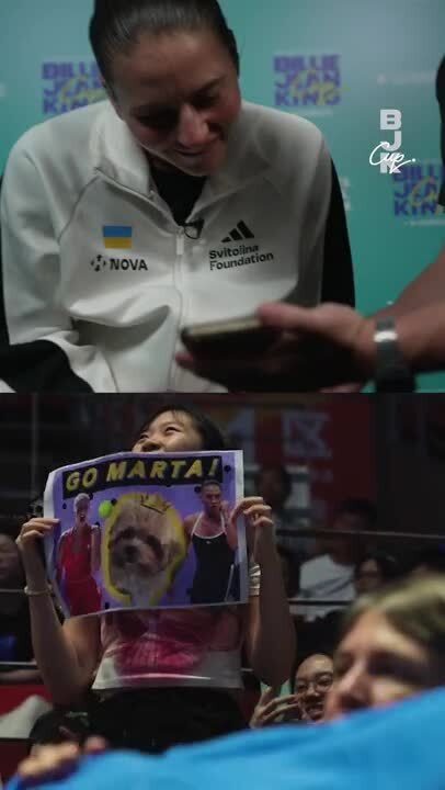 Marta Kostyuk reacts to fan poster of her dog