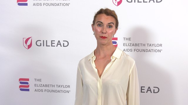 Naomi Wilding attends The Elizabeth Taylor Night of Compassion purple carpet