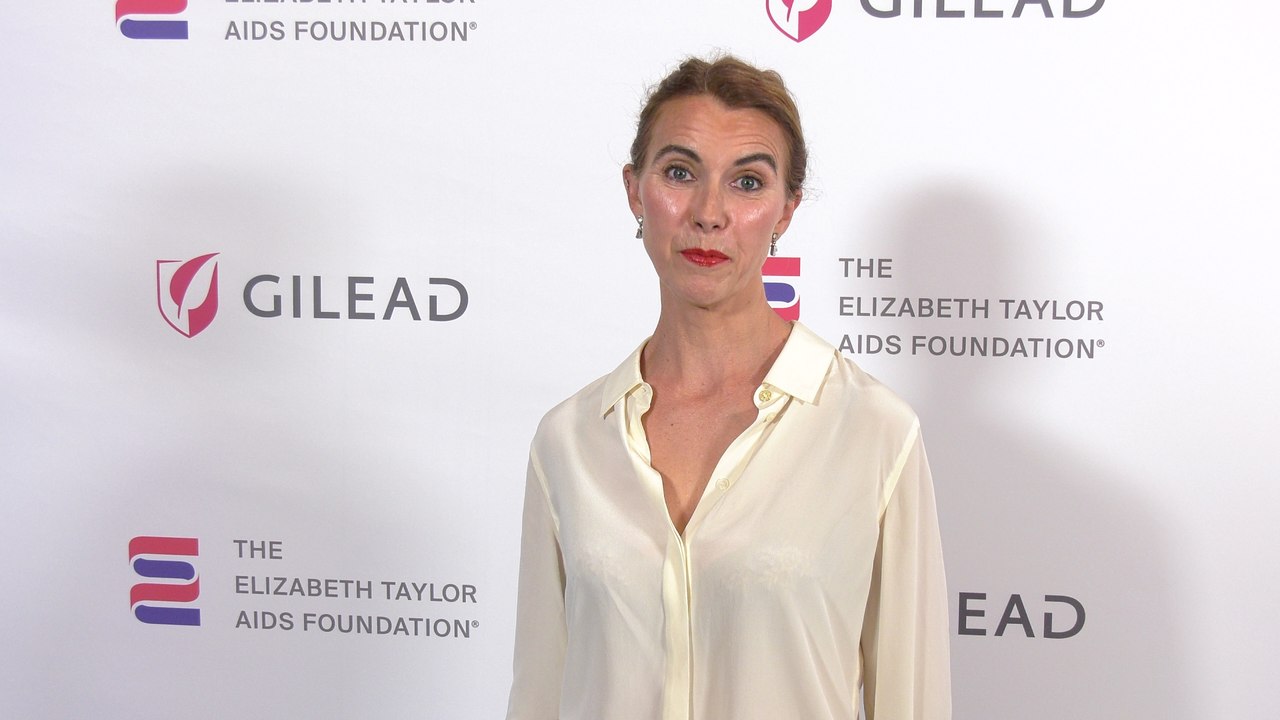 Naomi Wilding attends "The Elizabeth Taylor Night of Compassion" purple carpet