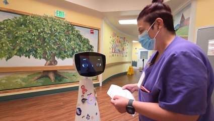 Robot programmed to act like a 7-year-old girl to help in hospitals
