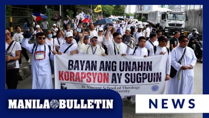 Thousands of protesters march towards EDSA People Power Monument