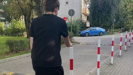 Boy clears every pole smoothly until final jump brings his shorts down