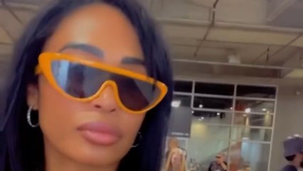 Pilar Sanders flexes eye-catching orange '12' top at Browns game