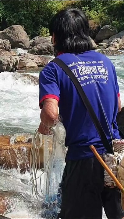 cast netting in Nepal | himalayan trout fishing with handmade cast net |