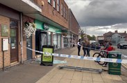 Car smashes through Specsavers shop window
