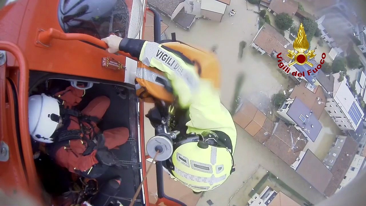 POV - Rescue of mother and child by firefighter helicopter in Italy