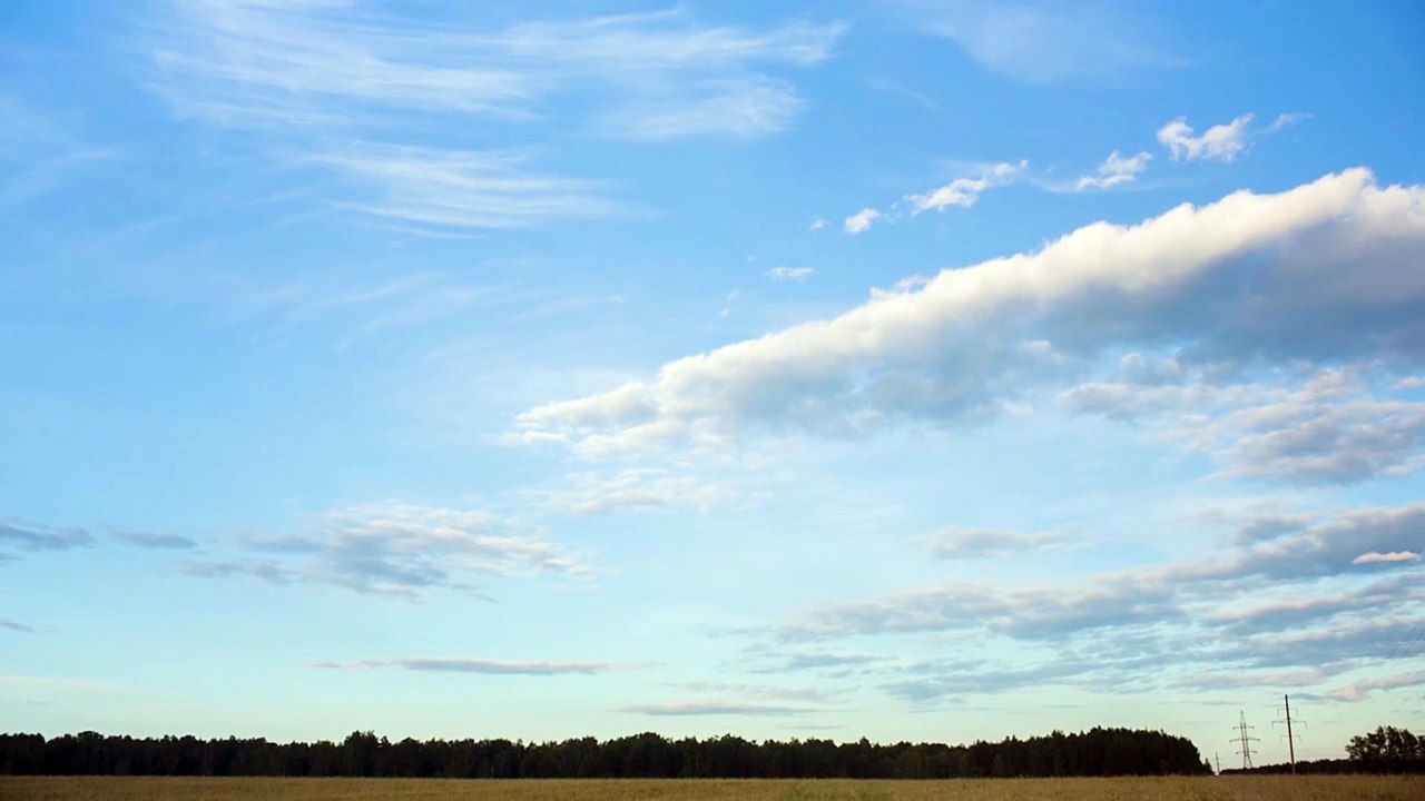 Blue Sky with Clouds over Forest