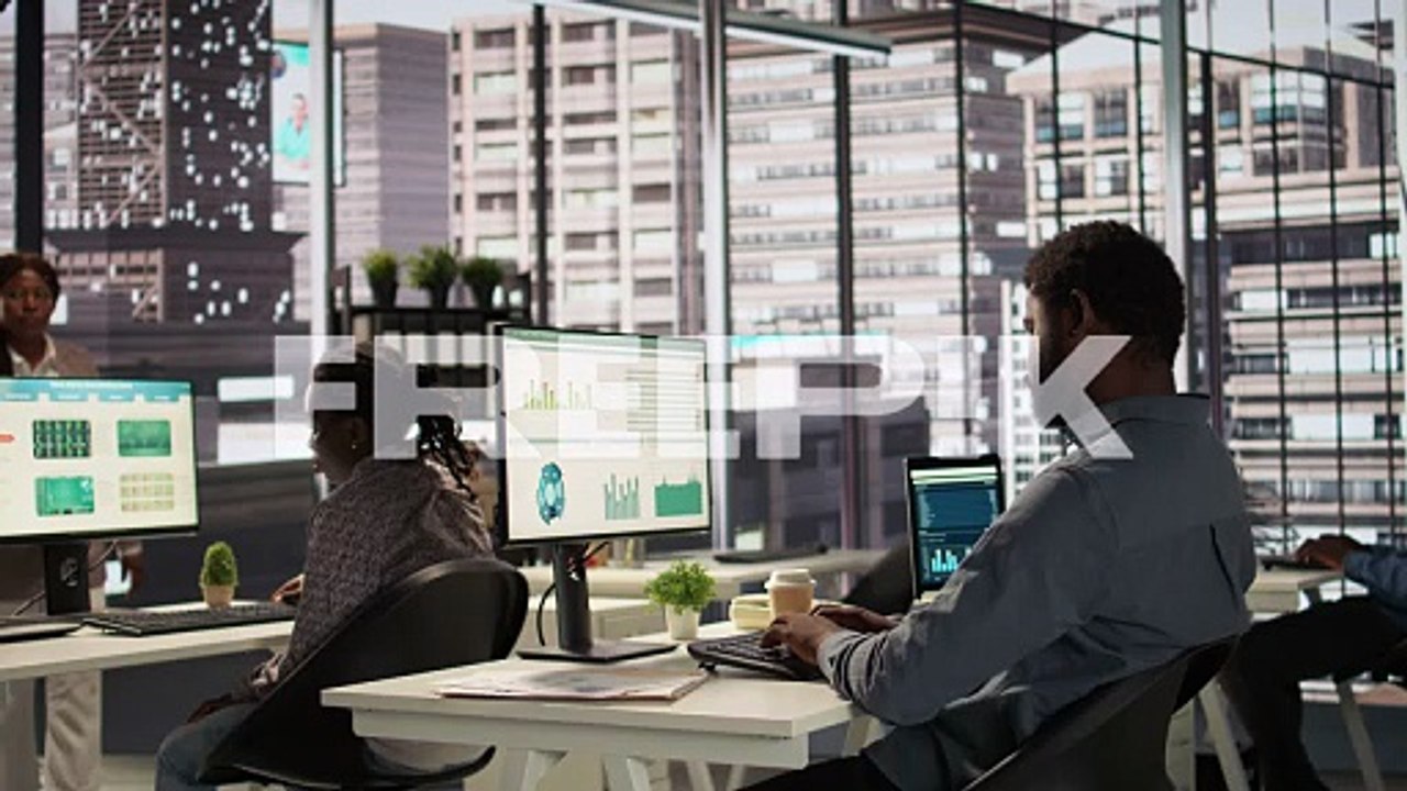 Busy Office Team Working on Financial Data Analysis