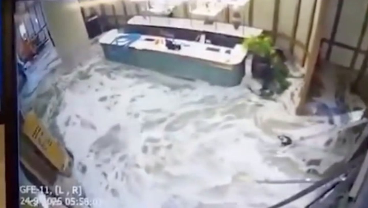 Wall of water smashes through Hong Kong hotel as guests flee Typhoon Ragas in panic