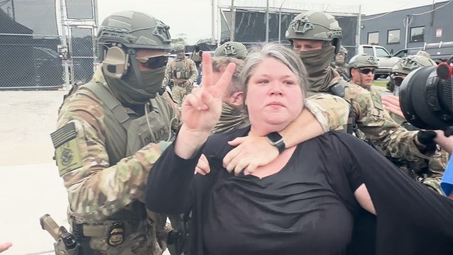 ICE agent appears to put woman in chokehold during protester clashes