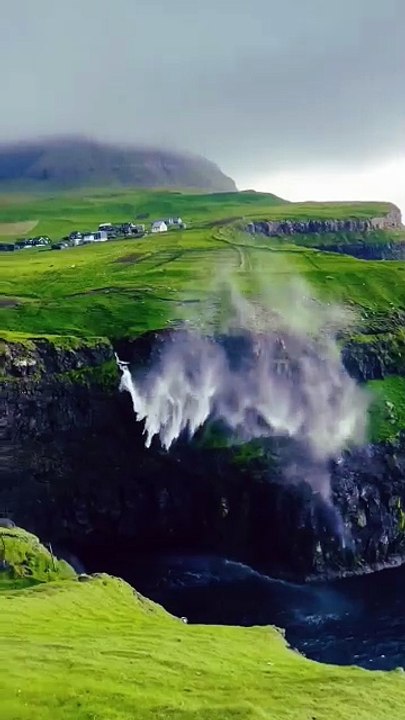 ✨ Serenity in motion 🌊🍃 A river’s song flowing through the green embrace of mountains 🏞️💚