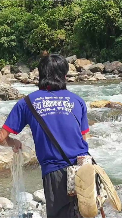 cast netting in Nepal | himalayan trout fishing with handmade cast net |