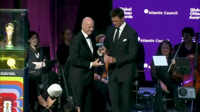 Gianni Infantino presented an award by NFL legend Tom Brady