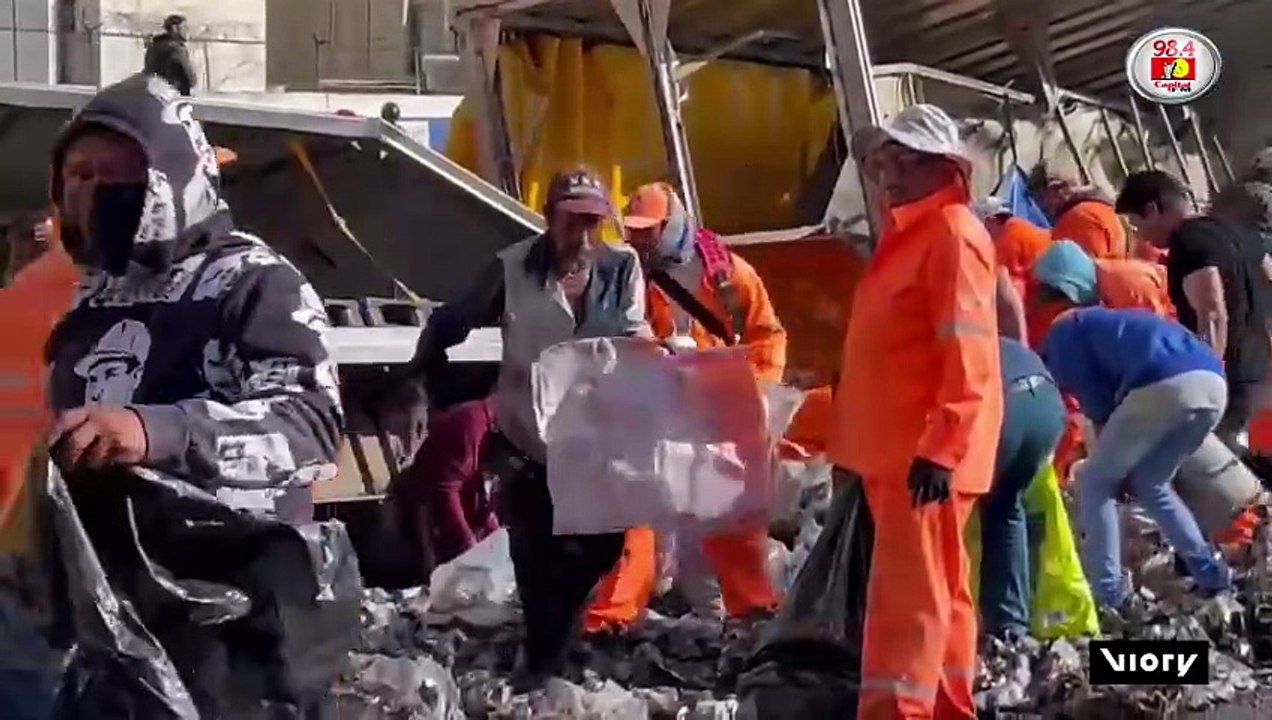 Highway free-for-all! Looters bag tonnes of booze as beer truck overturns in Mexico